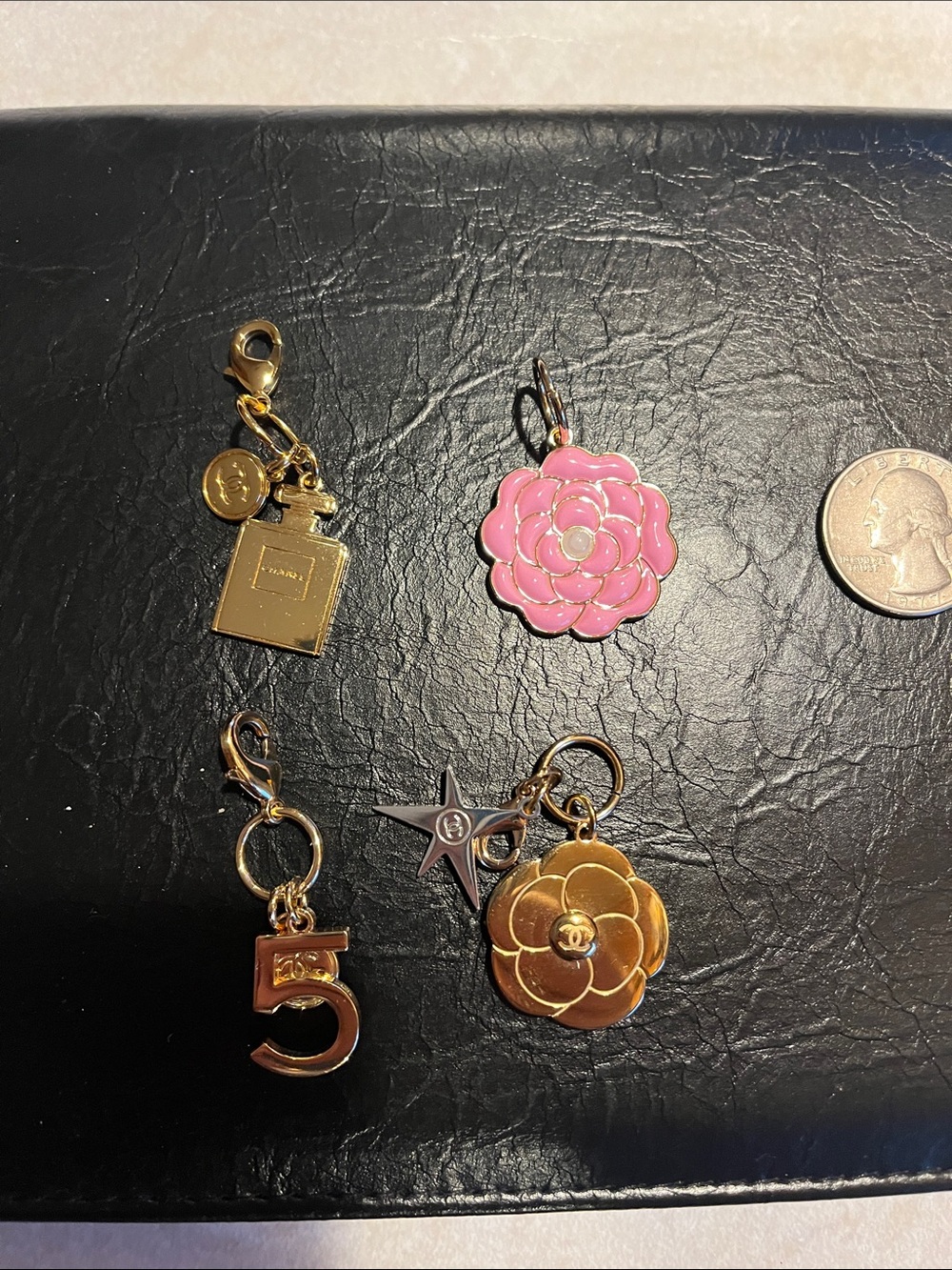 CHANEL Fragrance Pink and Gold Camellia & Number 5 Charm Set